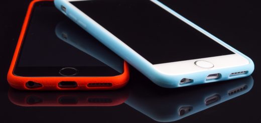 two phones on black background